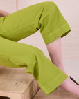 Action Pants in Gross Green pant leg close up on Margaret