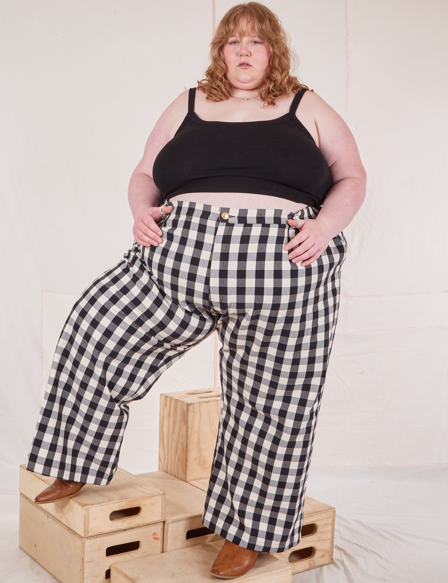 Catie is 5&#39;11&quot; and wearing 4XL Wide Leg Trousers in Big Gingham and black Cropped Cami