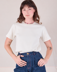 Burly Tee in Vintage Tee Off-White tucked into dark wash Denim Wide Leg Trousers on Alex