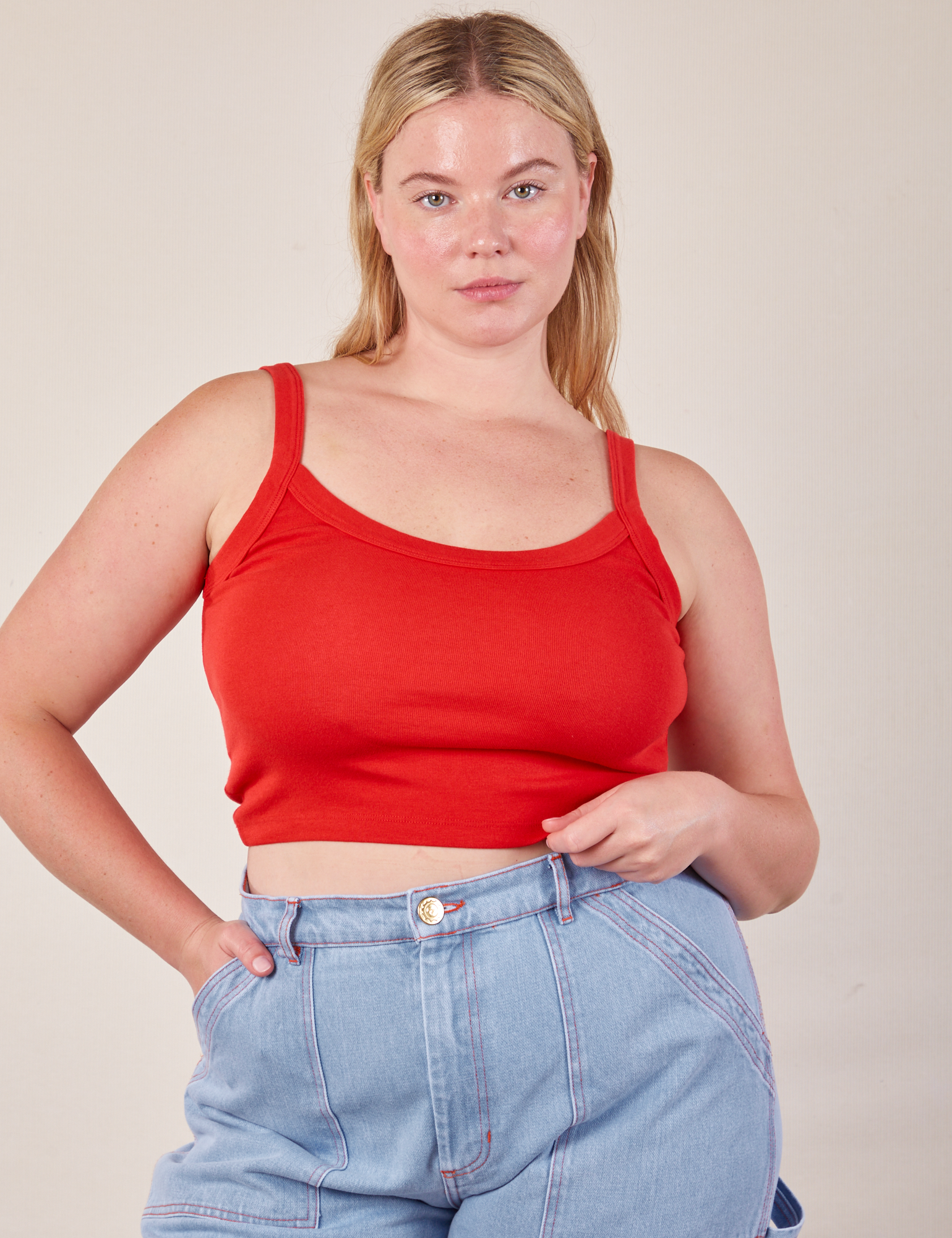 Lish is 5’8” and wearing M Cropped Cami in Mustang Red