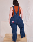 Carpenter Overalls in Dark Wash back view on Ashley
