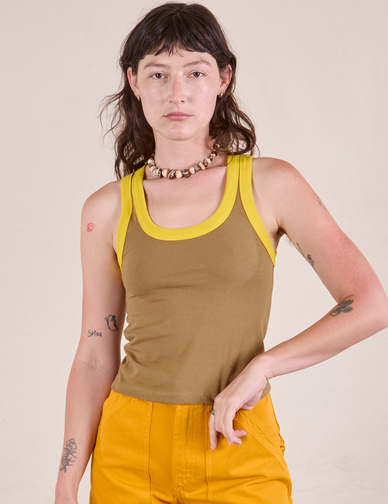 Alex is 5&#39;8&quot; and wearing P Colorblock Cropped Tank in Desert Brown