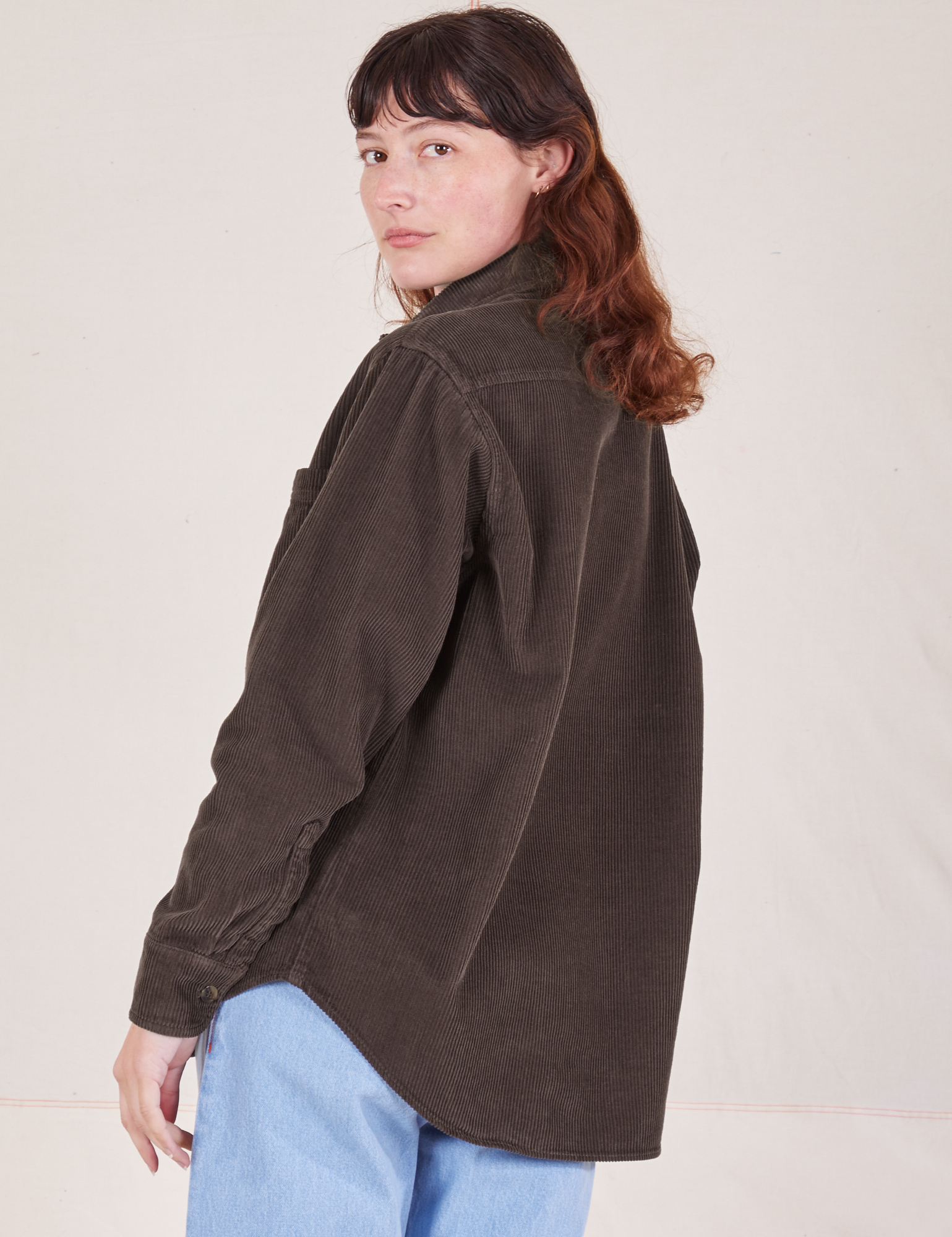 Angled back view of Corduroy Overshirt in Espresso Brown on Alex