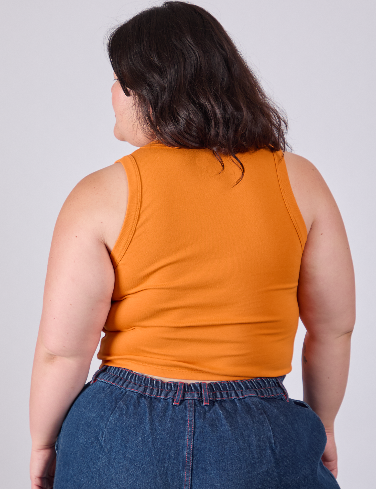 Cropped Tank Top in Creamsicle Orange back view on Ashley