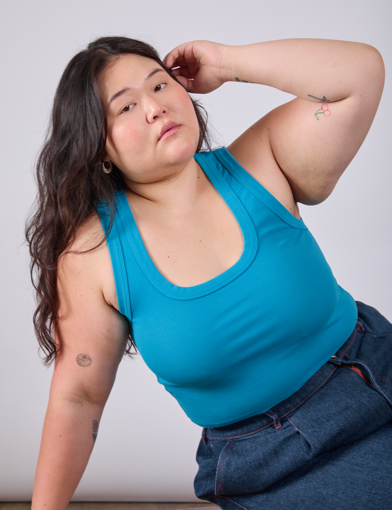 Ashley is wearing Cropped Tank Top in Hawaiian Blue