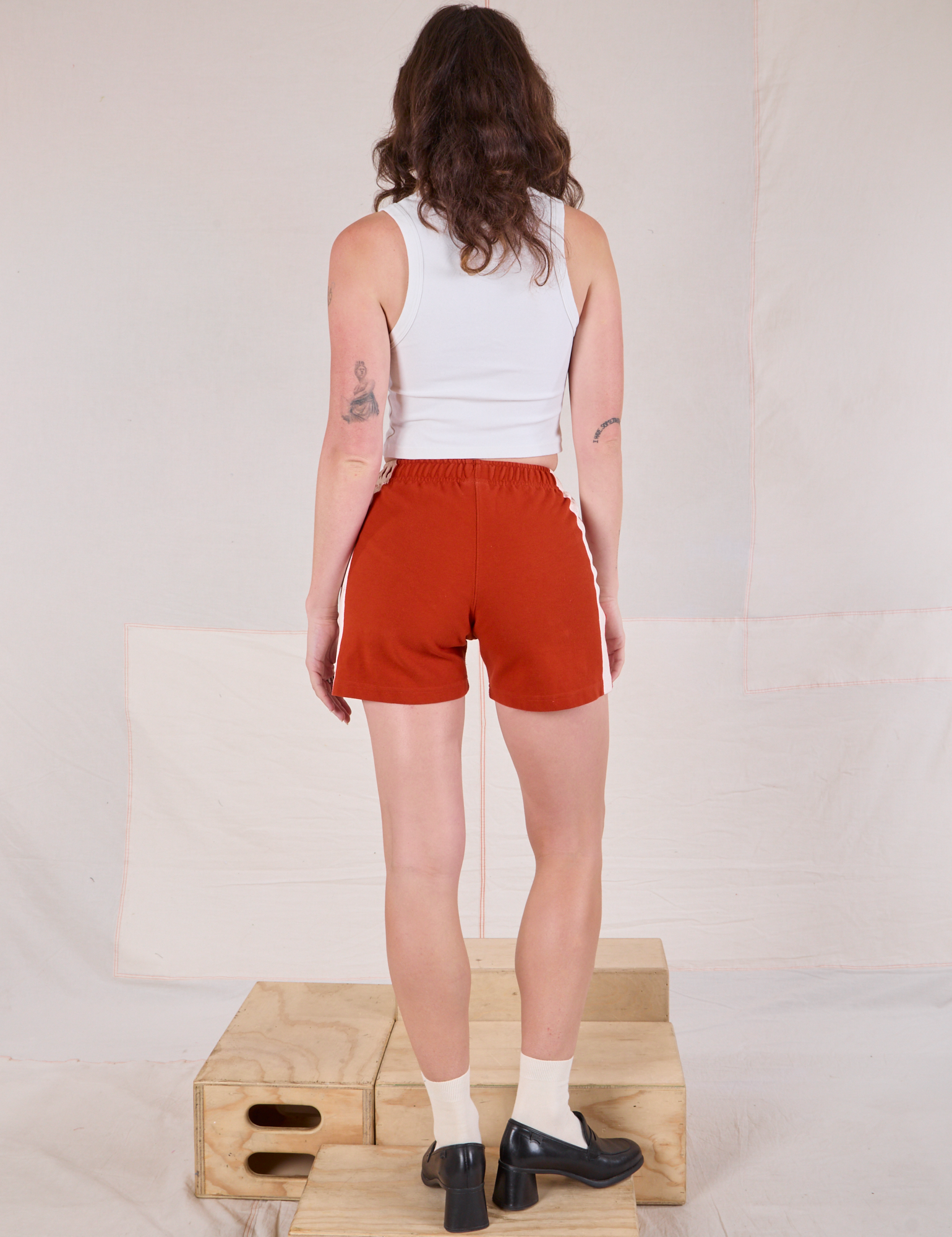 Back view of Painted Stripe Easy Shorts in Paprika and Cropped Tank in Vintage Tee White on Alex