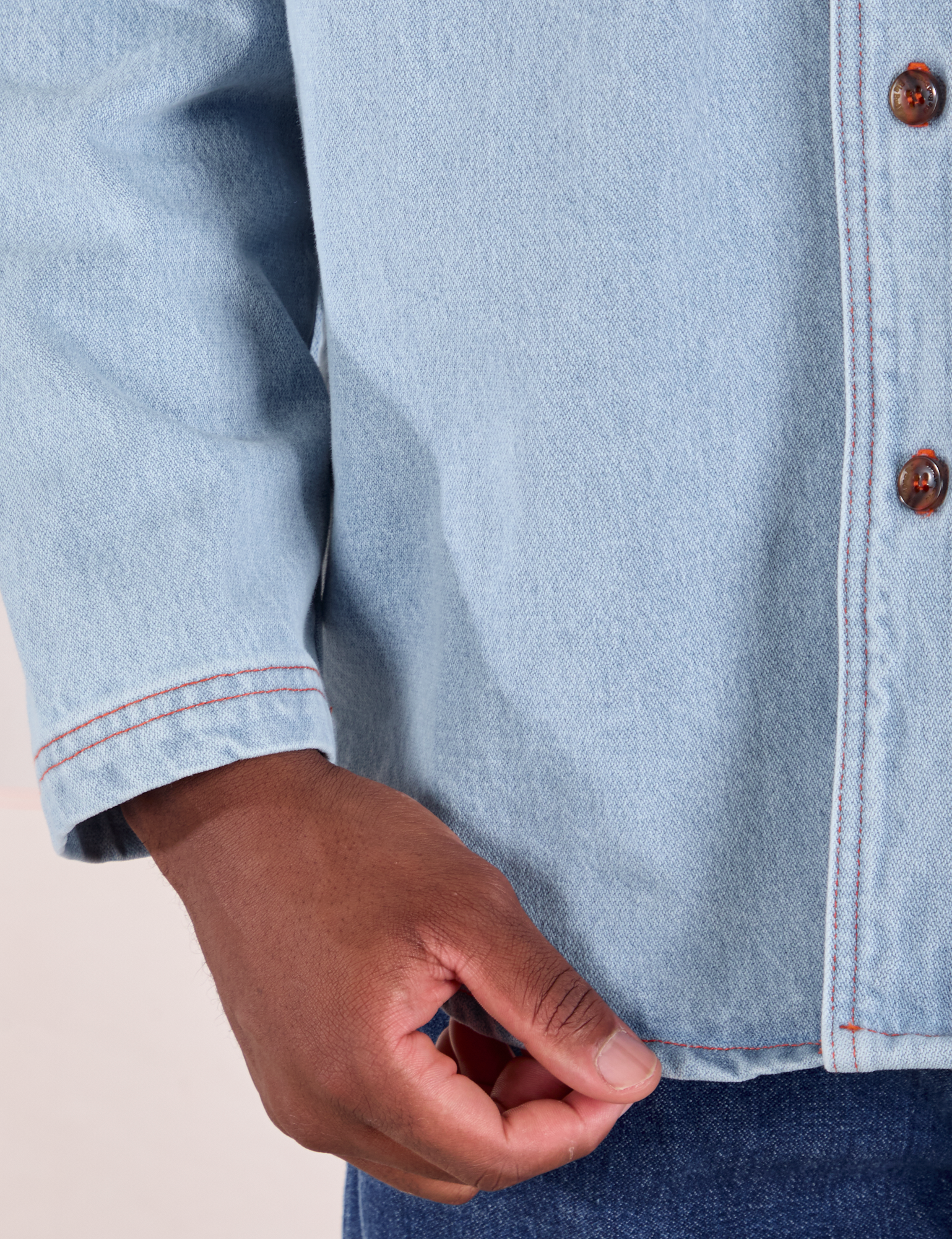 Denim Overshirt in Light Wash bottom close up on Issac