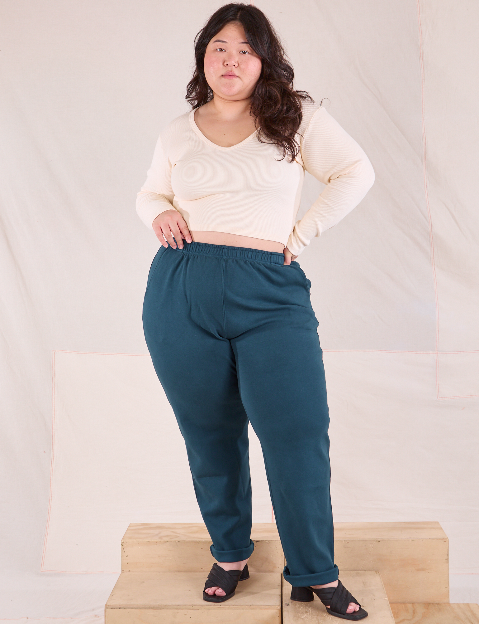 Ashley is 5&#39;7&quot; and wearing 0XL Easy Pants in Lagoon paired with vintage tee off-white Long Sleeve V-Neck Tee