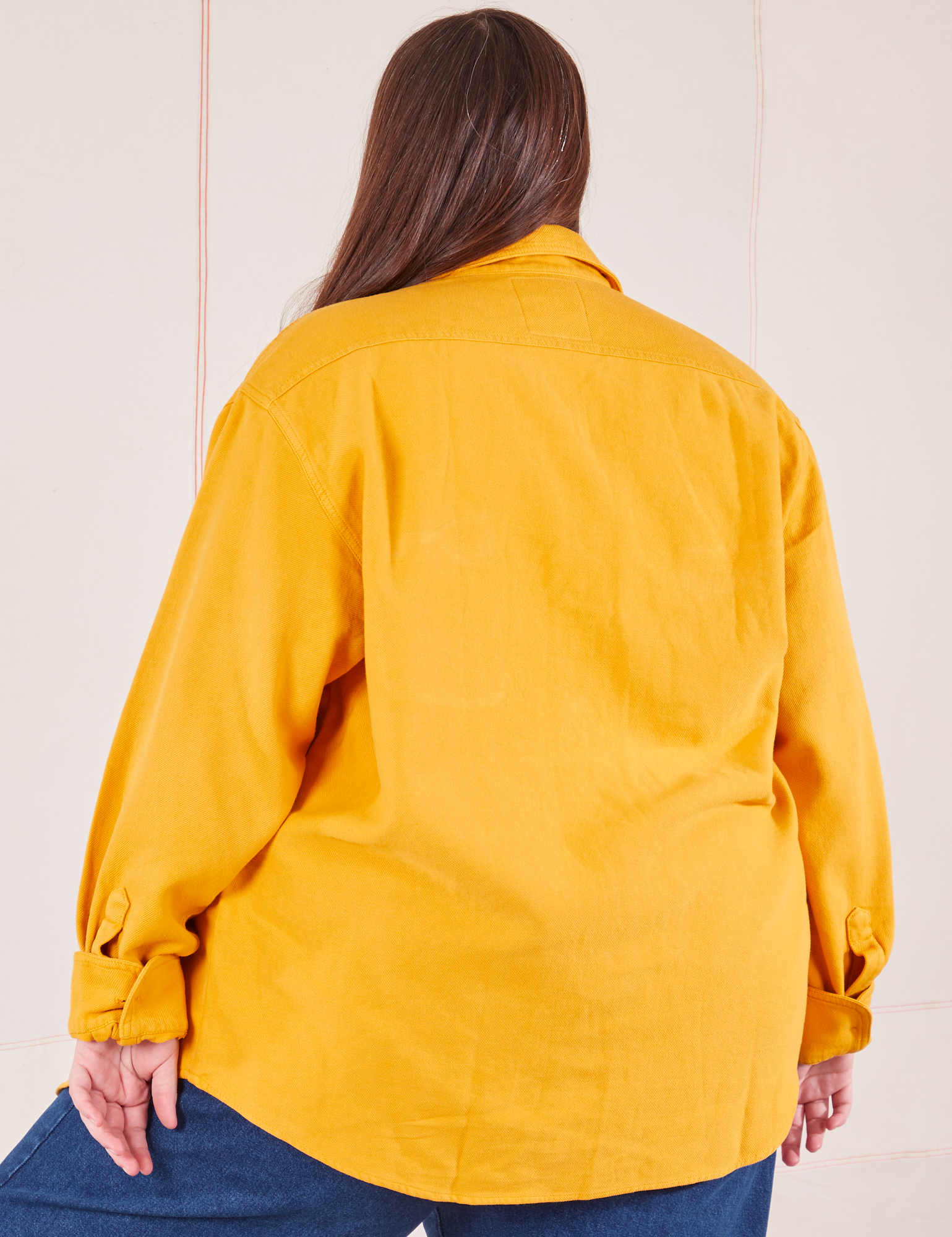 Back view of Flannel Overshirt in Mustard Yellow on Marielena