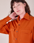 Flannel Overshirt in Burnt Orange front close up on Alex