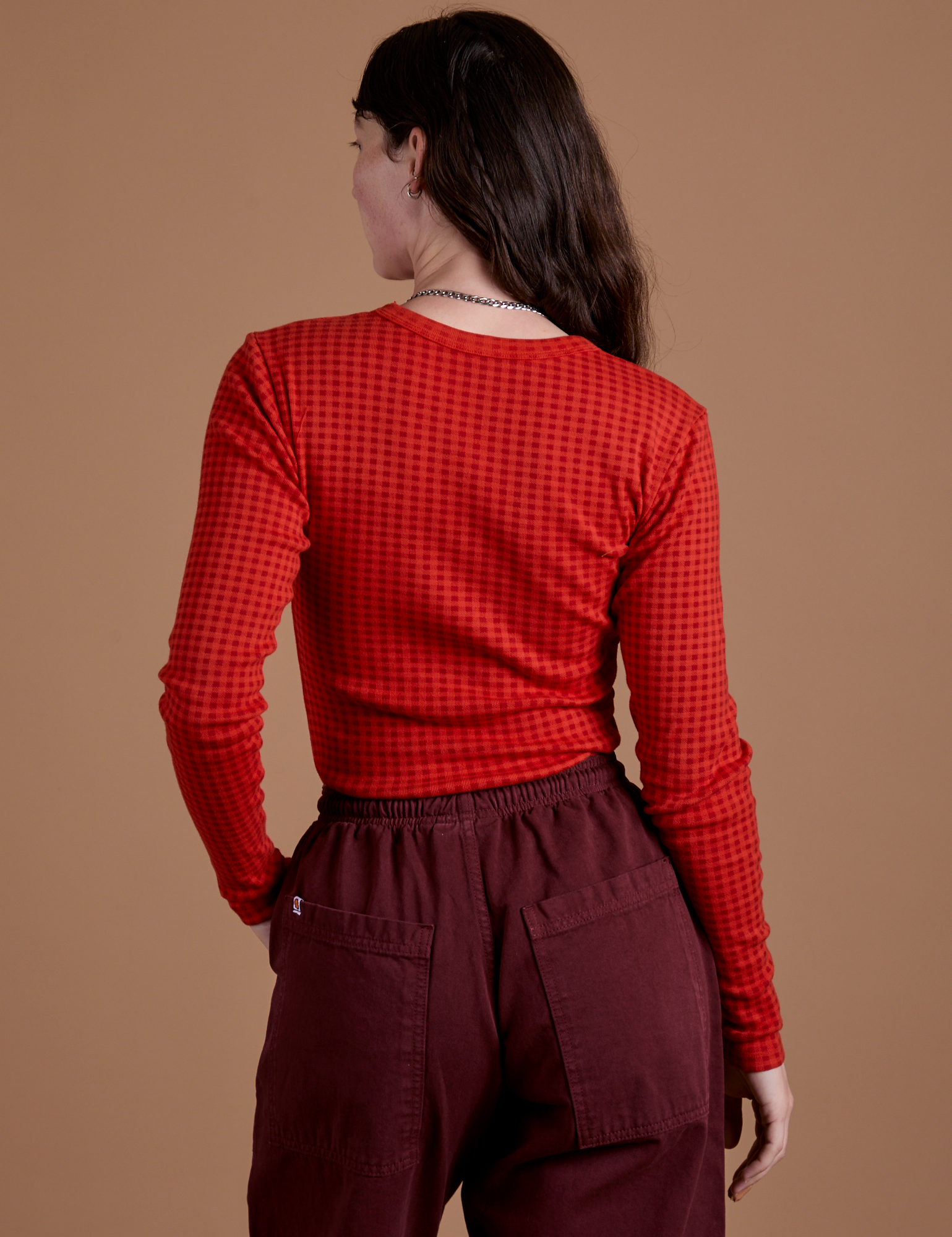 Gingham Long Sleeve Baby Tee in Mustang Red back view on Alex