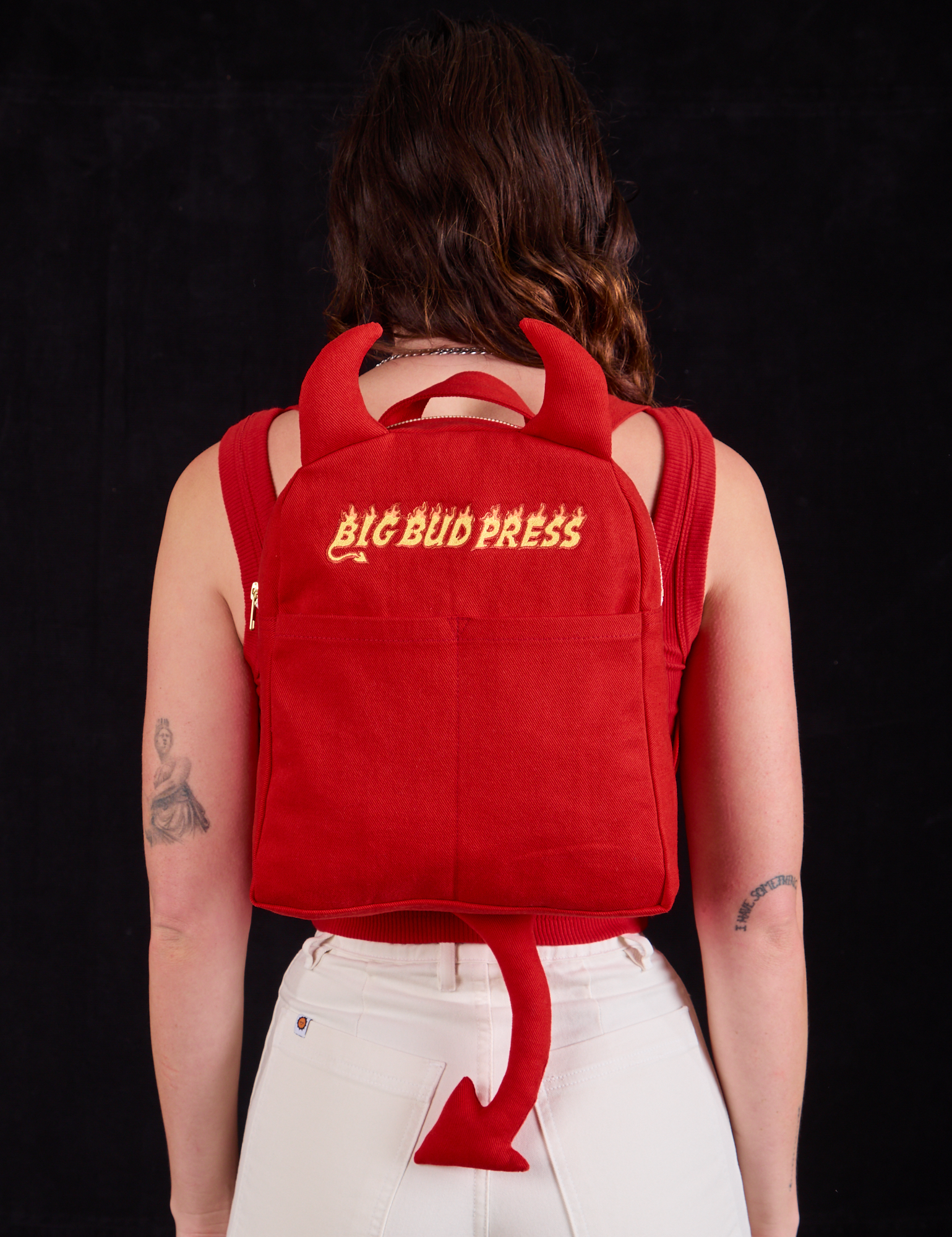 Devil Backpack worn by Alex