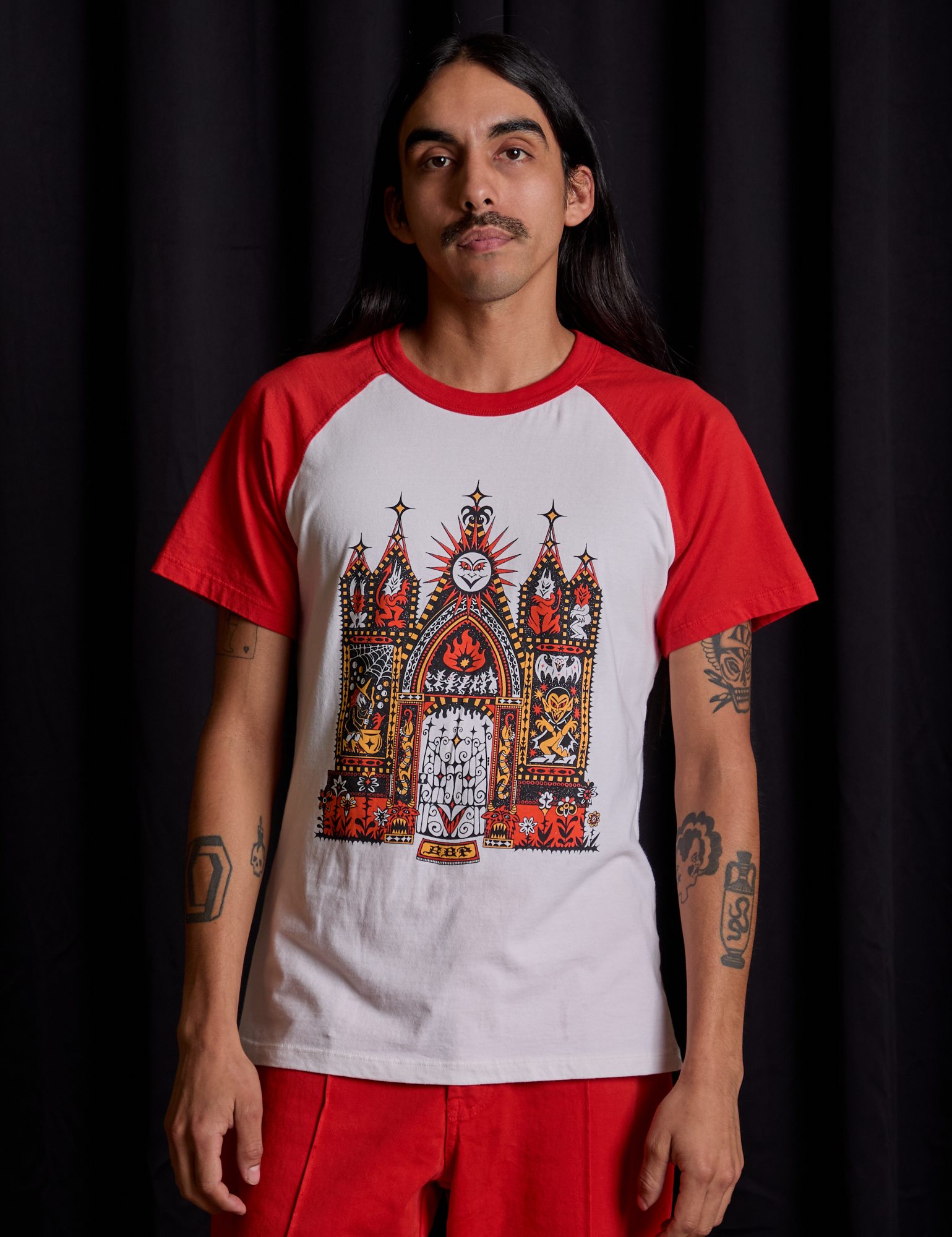 Anthony is 5&#39;6&quot; and wearing S Short Sleeve Raglan Tee in Gates of Hell