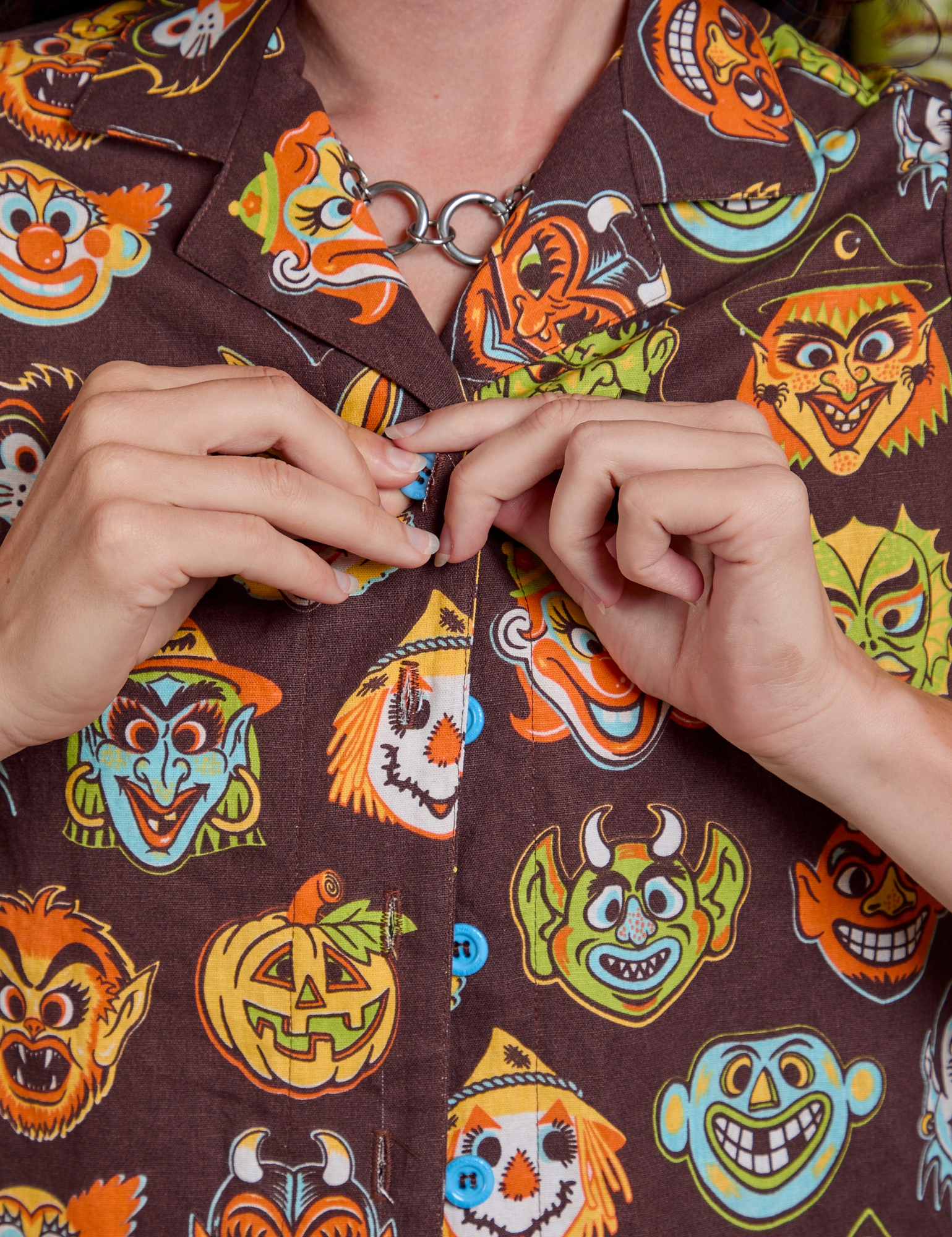 Front close up of Halloween Masks Pantry Button-Up on Alex