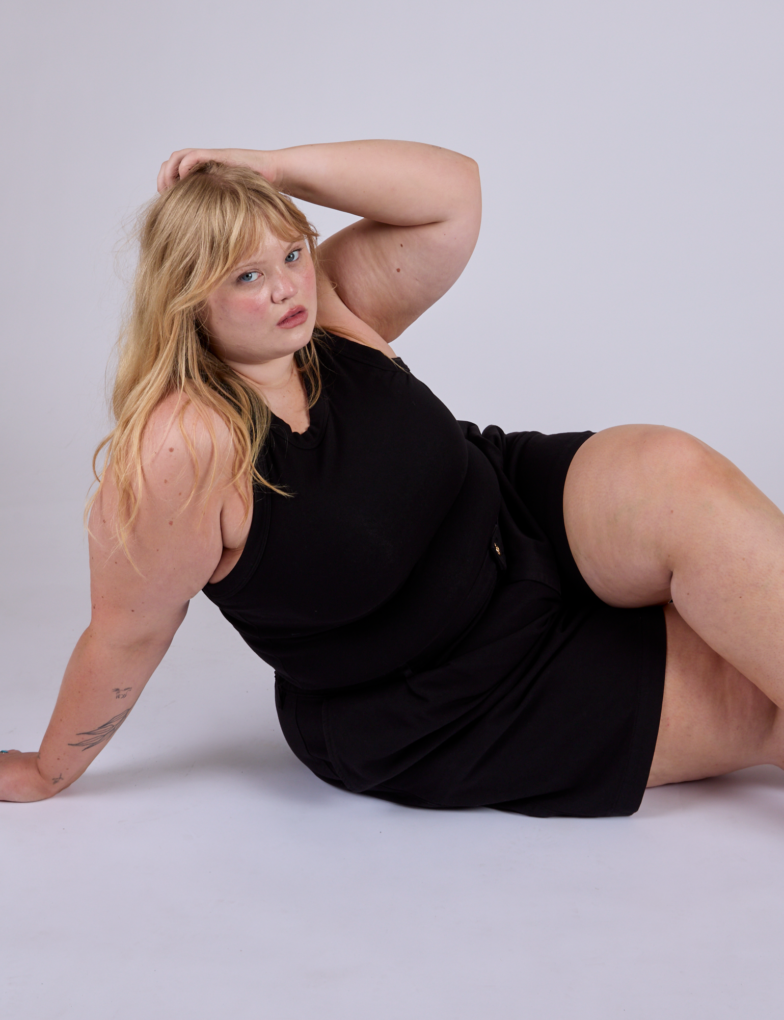 Pleated Trouser Shorts in Basic Black and Racerback Tank in Black on Juliet