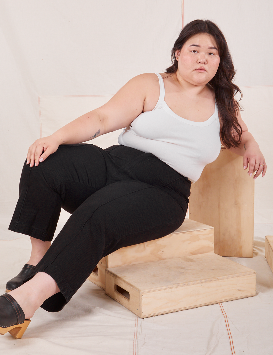 Ashley is wearing Heritage Westerns in Basic Black and vintage off-white Cropped Cami