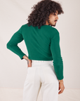 Back view of Long Sleeve V-Neck Tee in Hunter Green on Jesse