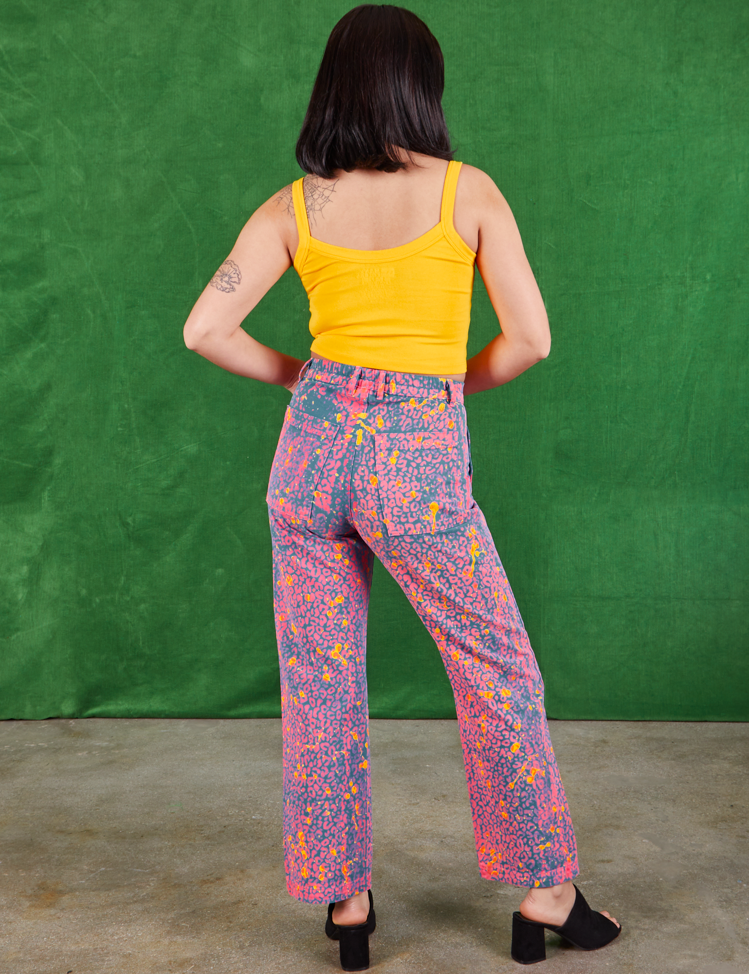 Back view of Work Pants in Electric Leopard and sunshine yellow Cami on Betty