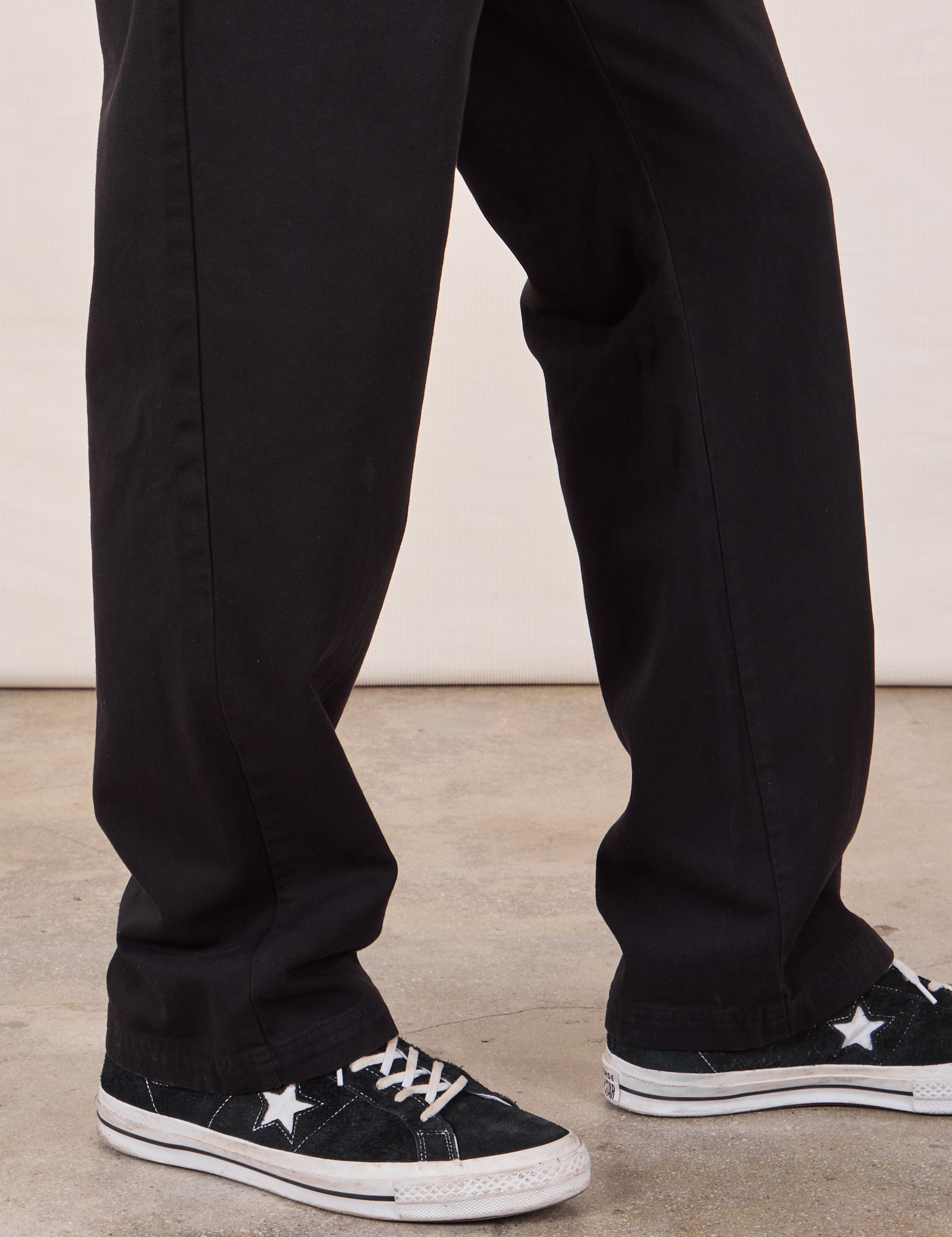 Long Jumpsuit in Basic Black pant leg close up on Jerrod