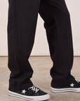 Long Jumpsuit in Basic Black pant leg close up on Jerrod