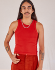 Anthony is 5’10” and wearing S Racerback Tank in Mustang Red