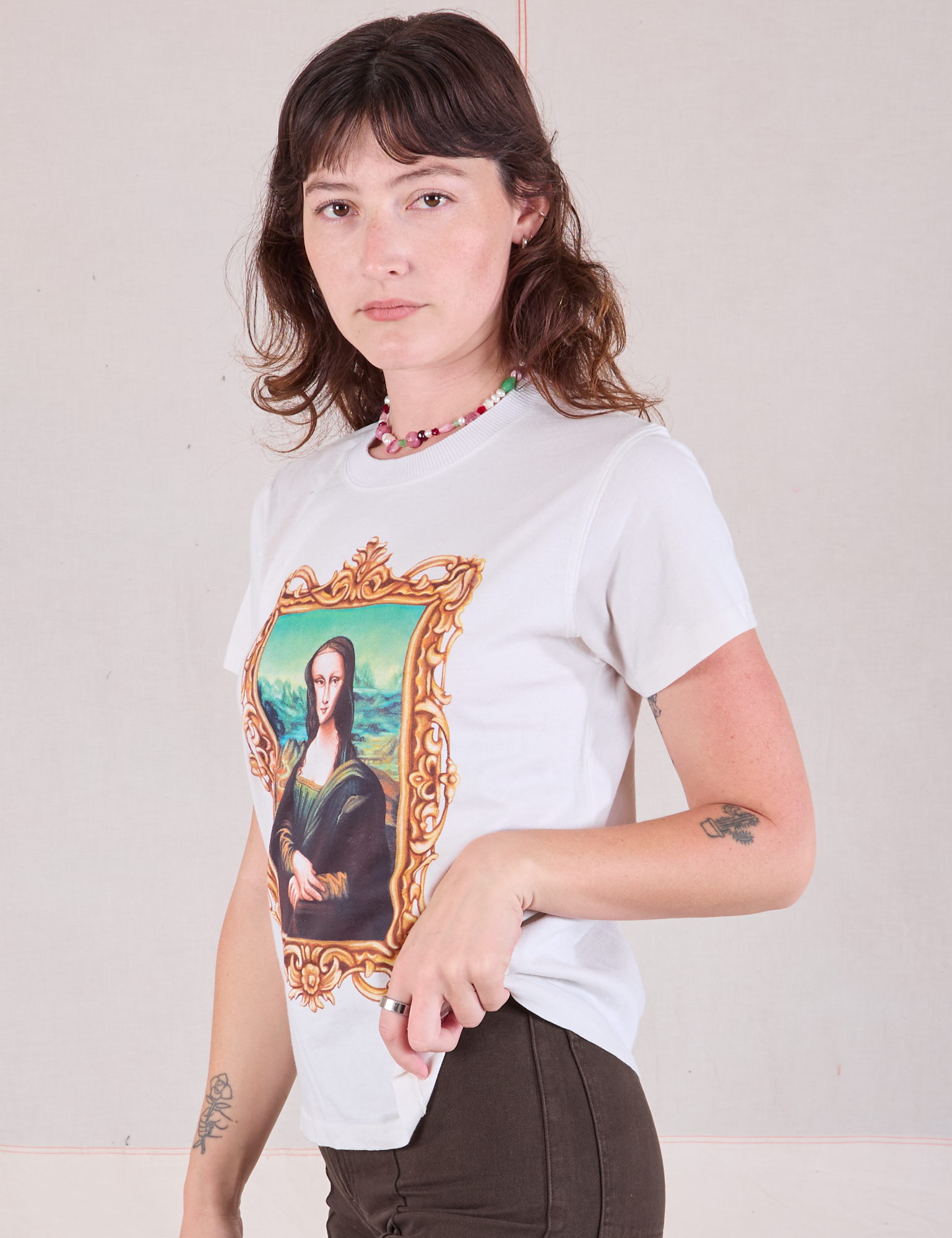 Masters Organic Tee in Mona Lisa angled view on Alex