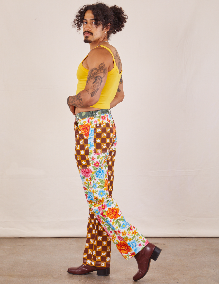 Side view of Mismatched Print Work Pants and sunshine yellow Cropped Cami worn by Jesse