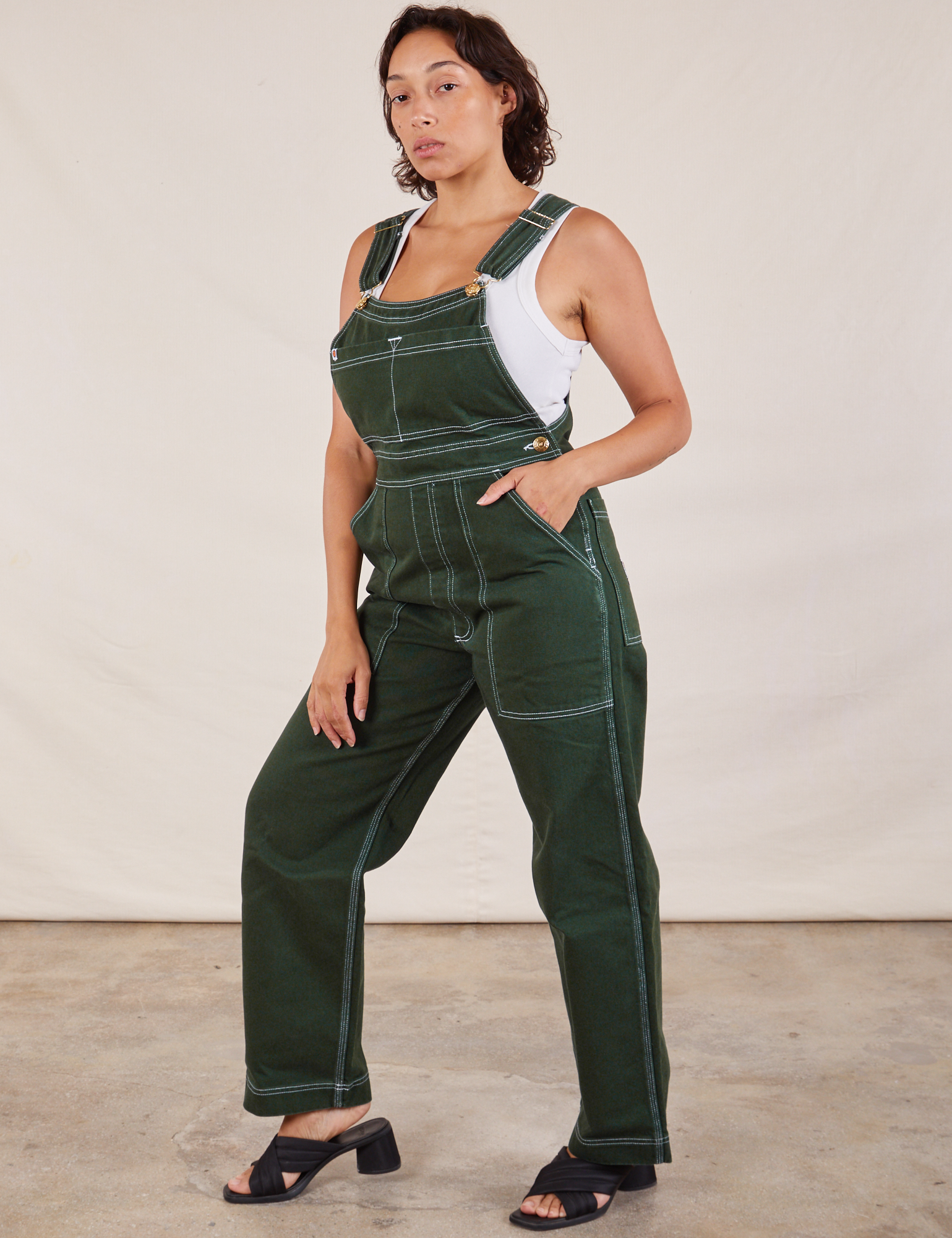 Original Overalls in Swamp Green angled front view on Tiara