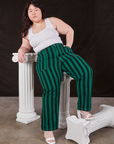 Ashley is wearing Black Stripe Work Pants in Hunter and vintage off-white Cropped Tank Top