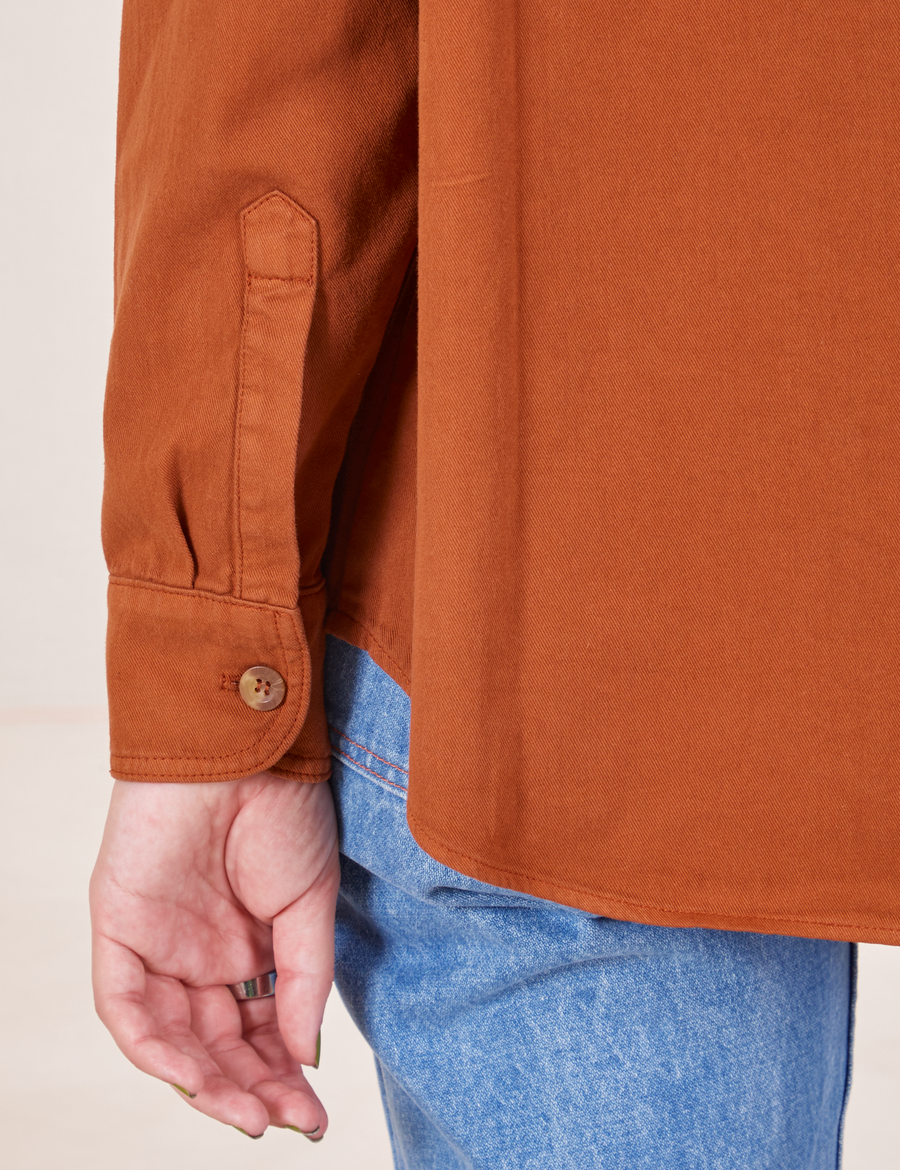 Sleeve close up of Oversize Overshirt in Burnt Terracotta worn by Alex