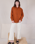 Alex is 5’8” and wearing P Twill Overshirt in Burnt Terracotta paired with vintage tee off-white Western Pants