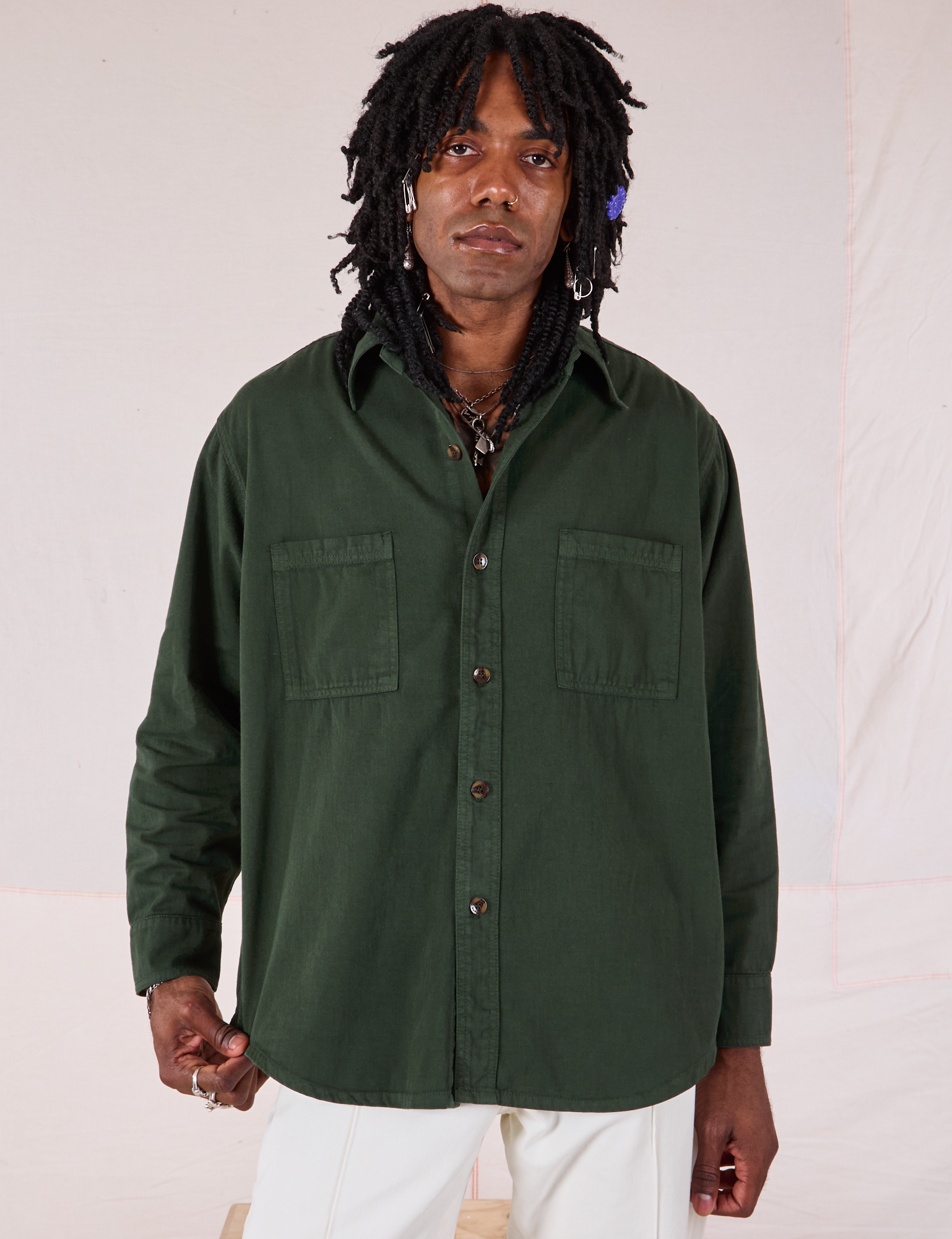 Jerrod is 6’3” and wearing S Twill Overshirt in Swamp Green