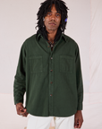 Jerrod is 6’3” and wearing S Twill Overshirt in Swamp Green