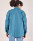 Back view of Oversize Overshirt in Marine Blue worn by Jesse