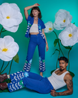 Jesse is wearing Paintstamped Work Pants in Daisy. Alex is wearing Paintstamped Work Pants in Daisy with matching Pantry Button-Up