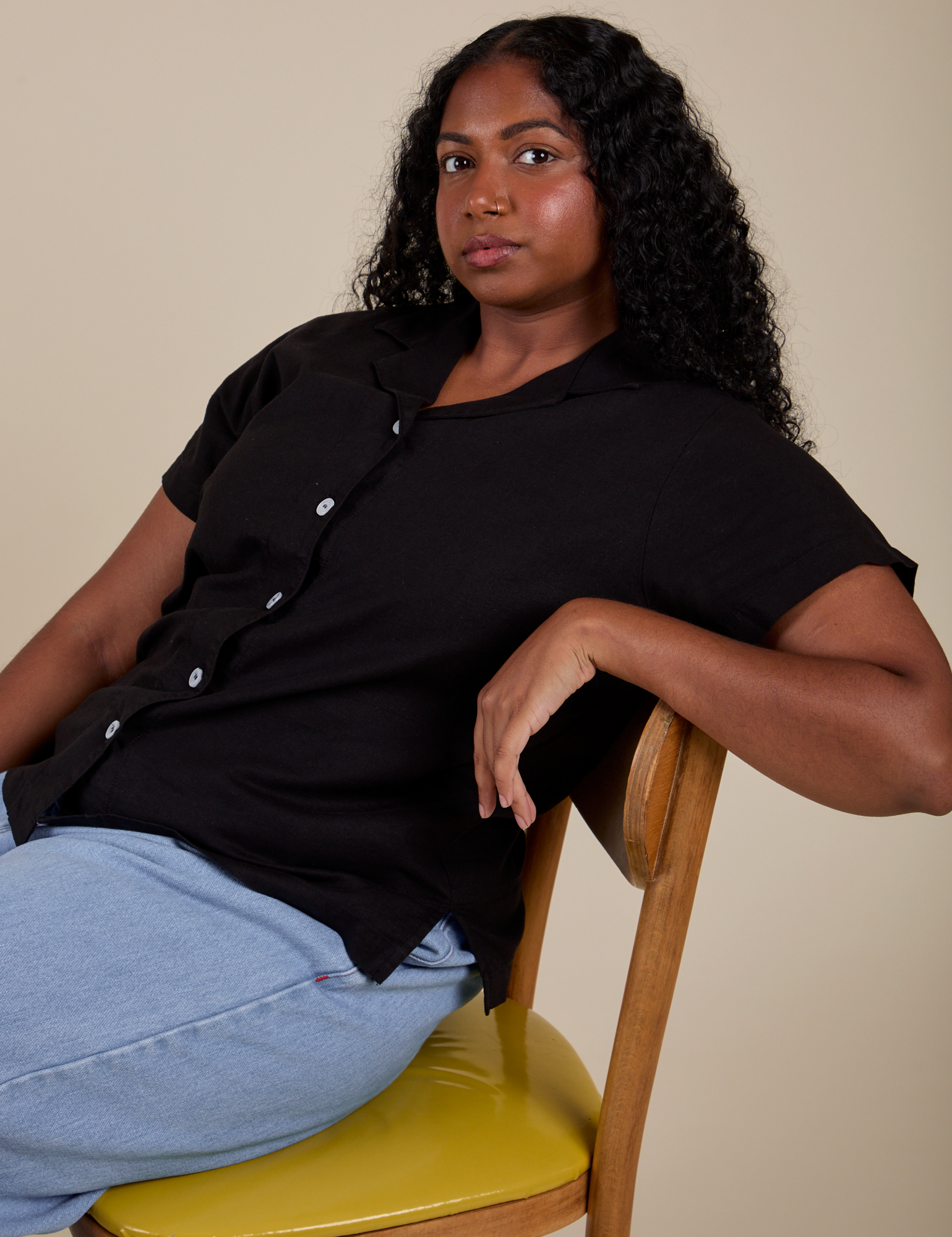 Meghna is wearing Pantry Button-Up in Basic Black