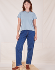 Alex is 5'8" and wearing P The Organic Vintage Tee in Periwinkle paired with dark wash Denim Trouser Jeans