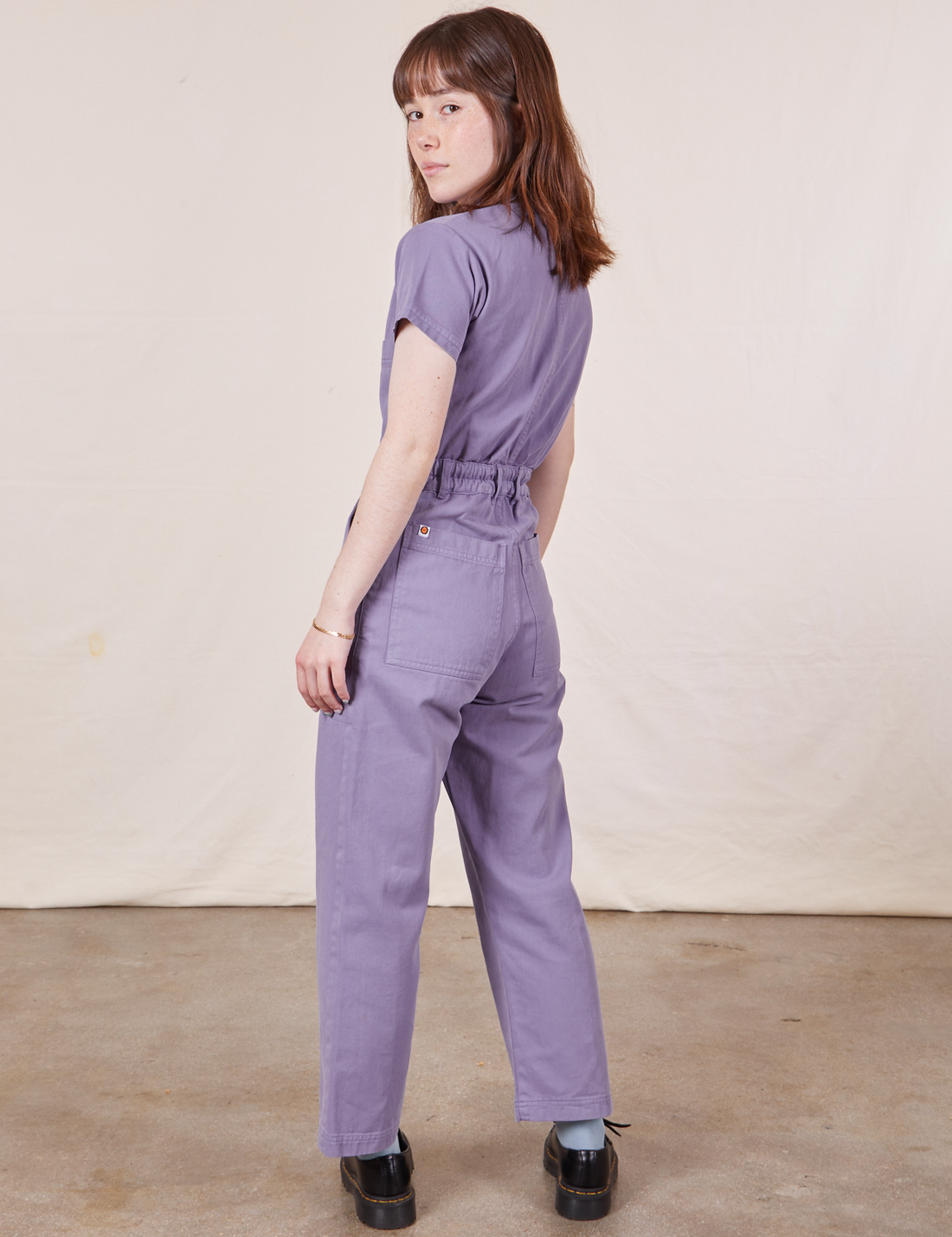 Petite Short Sleeve Jumpsuit in Faded Grape back view on Hana