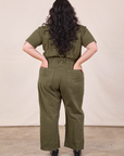 Petite Short Sleeve Jumpsuit in Surplus Green back view on Ari