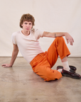 Work Pants in Construction Orange and Burly Tee in Vintage Tee Off-White on Quinn