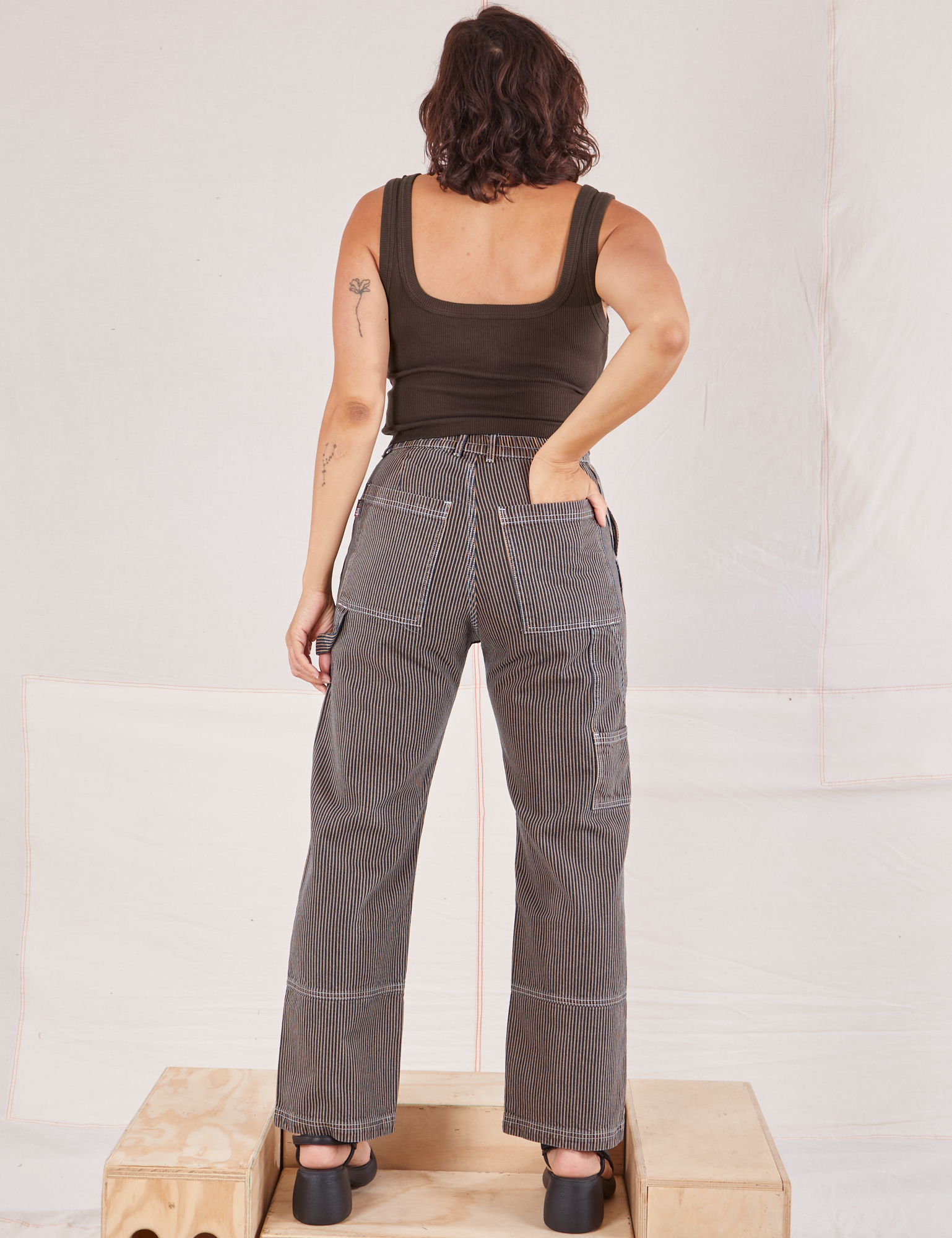 Back view of Railroad Carpenter Jeans in Vintage Tan and espresso brown Square Neck Tank on Tiara