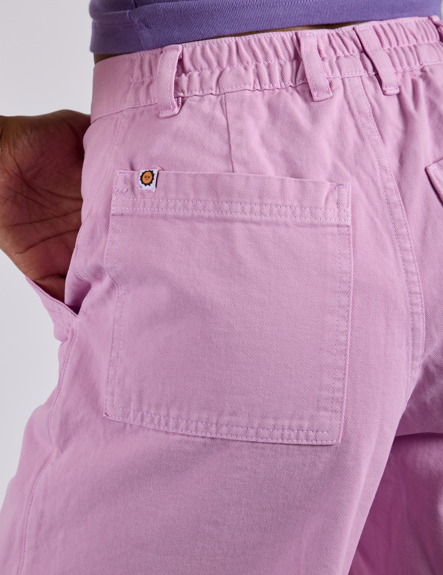 Longline Work Shorts in Lilac Purple back close up on Kira