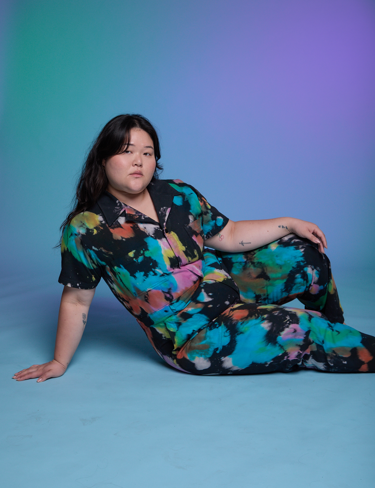 Short Sleeve Jumpsuit in Rainbow Magic Waters worn by Ashley