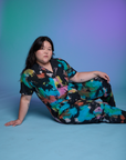 Short Sleeve Jumpsuit in Rainbow Magic Waters worn by Ashley