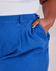 Heavyweight Trousers in Royal Blue front pocket close up with Morgan's hand in the pocket.