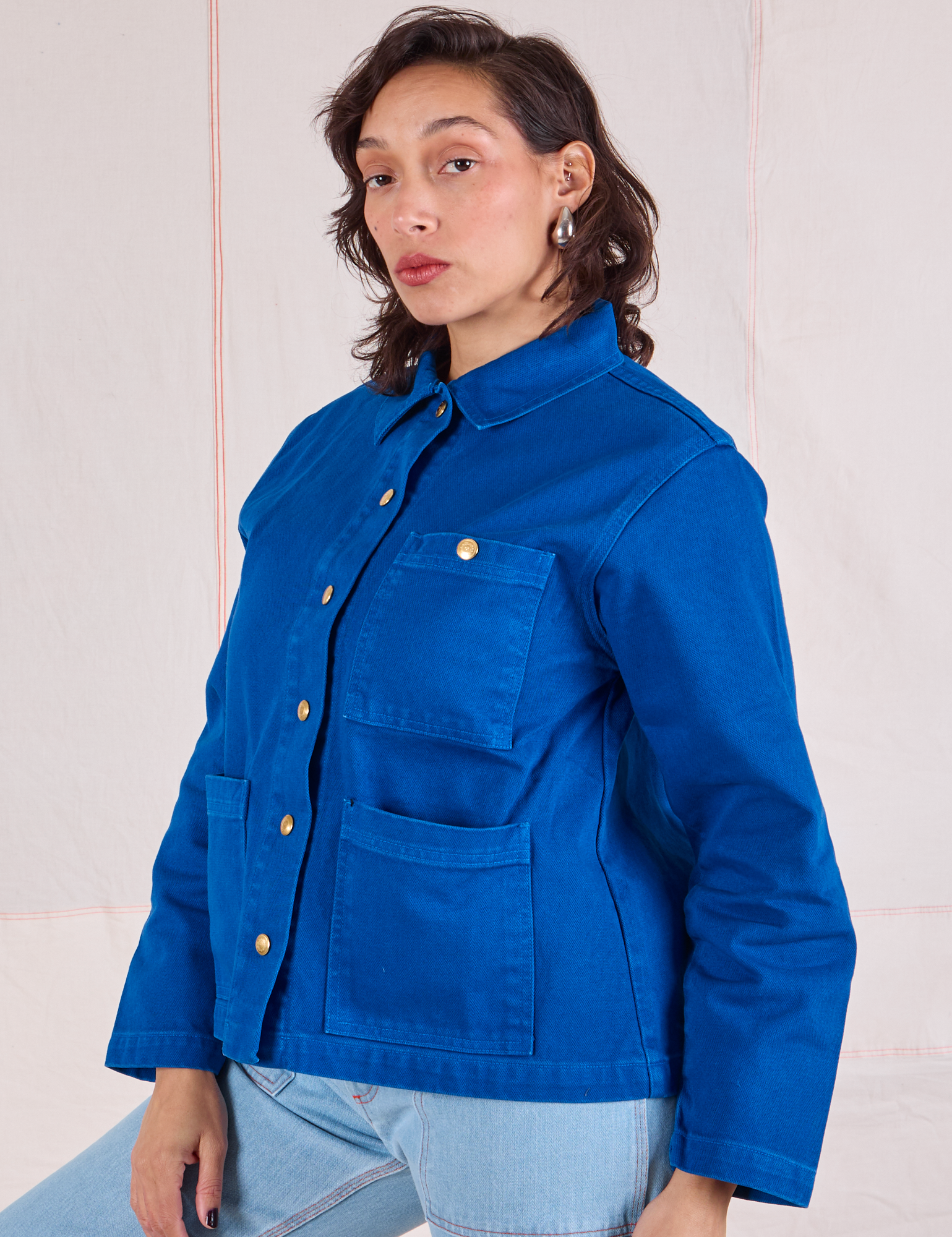 Denim Work Jacket in Royal Blue angled front view on Tiara