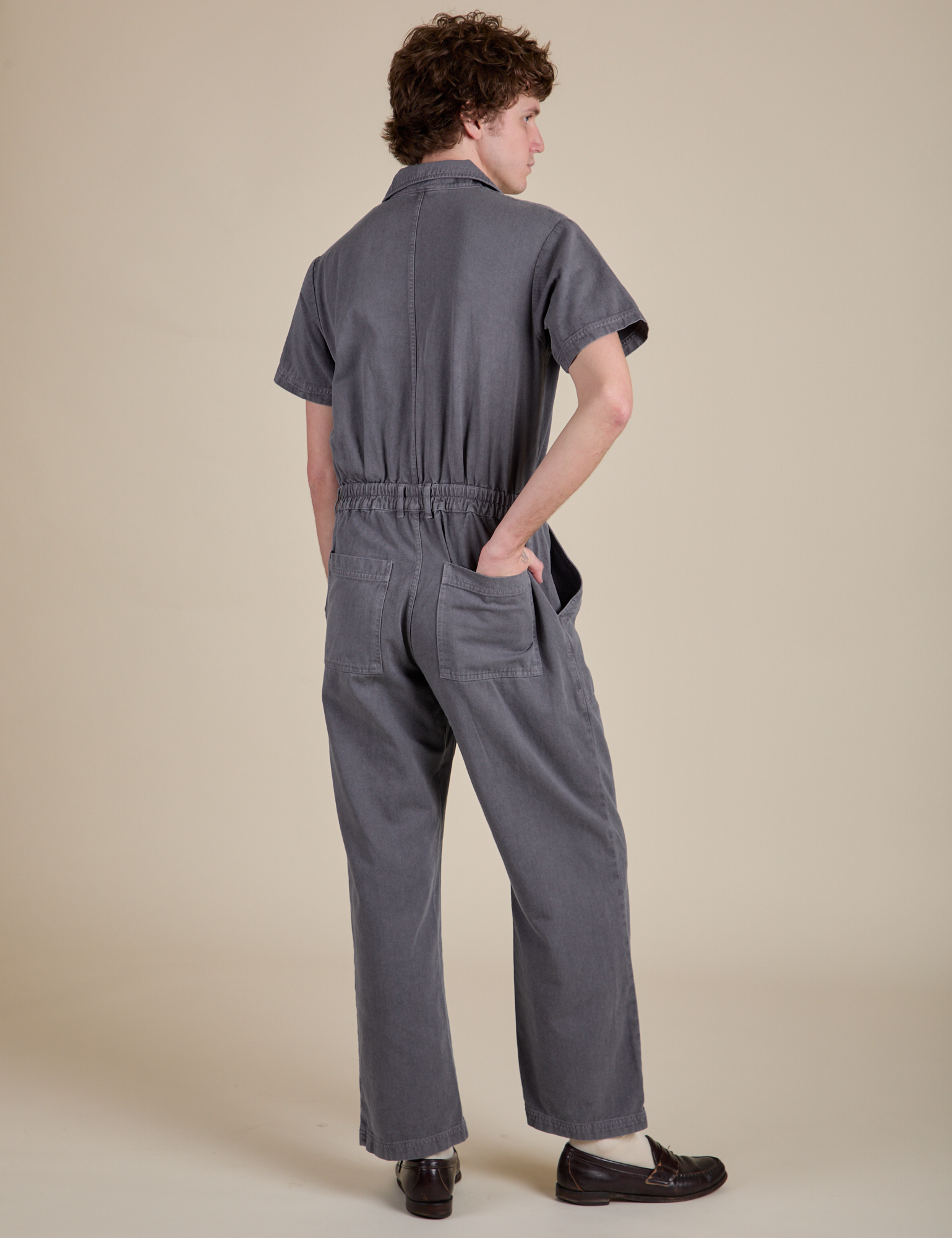 Back view of Short Sleeve Jumpsuit in Washed Grey on Quinn
