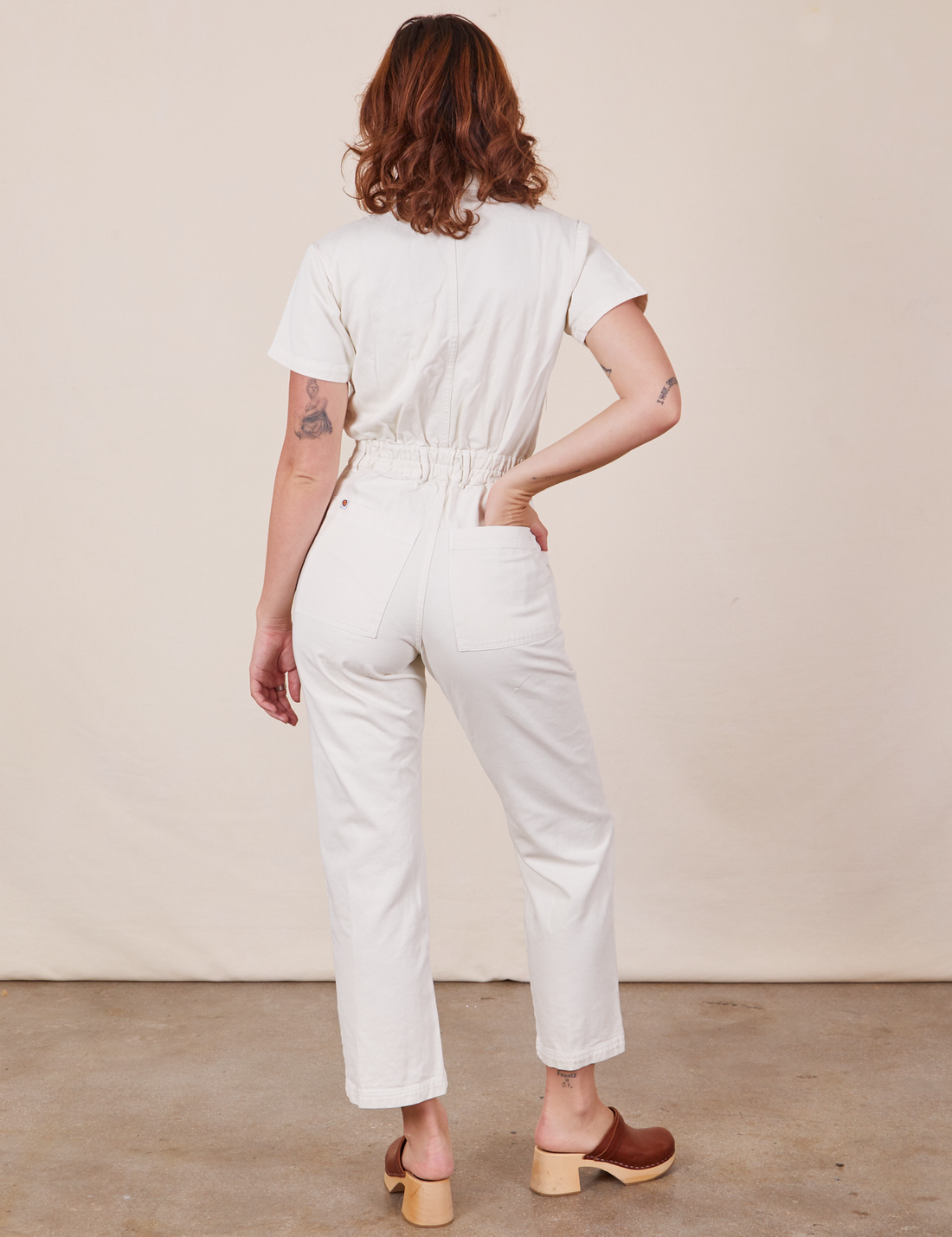 Back view of Short Sleeve Jumpsuit in Vintage Tee Off-White worn by Alex