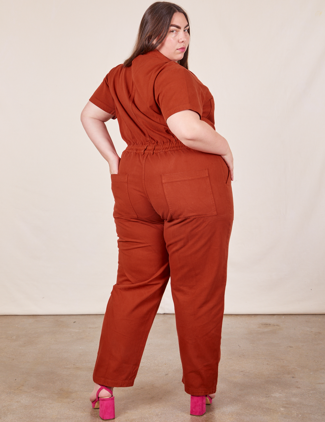 Back view of Short Sleeve Jumpsuit in Paprika worn by Marielena