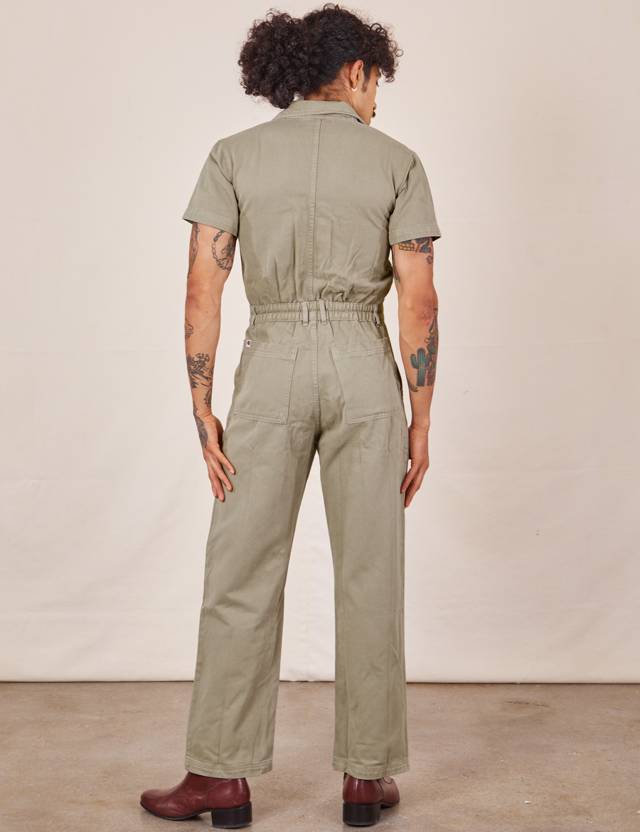 Back view of Short Sleeve Jumpsuit in Khaki Grey worn by Jesse